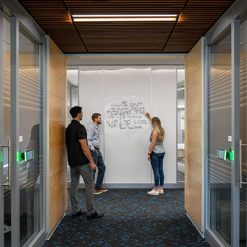 Advita Ortho team collaborating on white boards