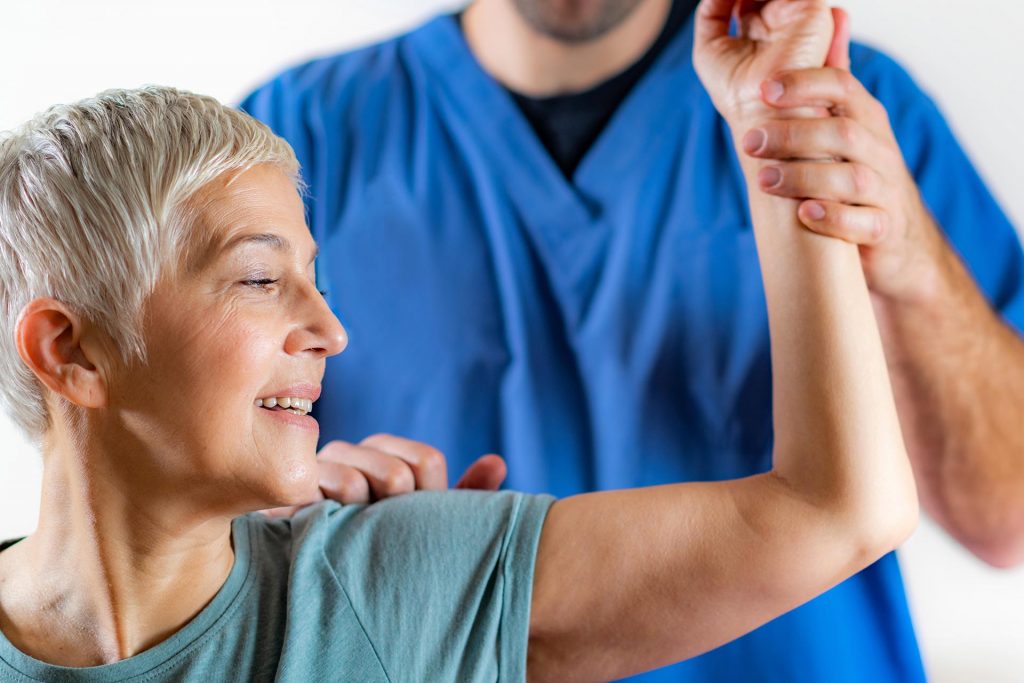Shoulder patient with a surgeon doctor