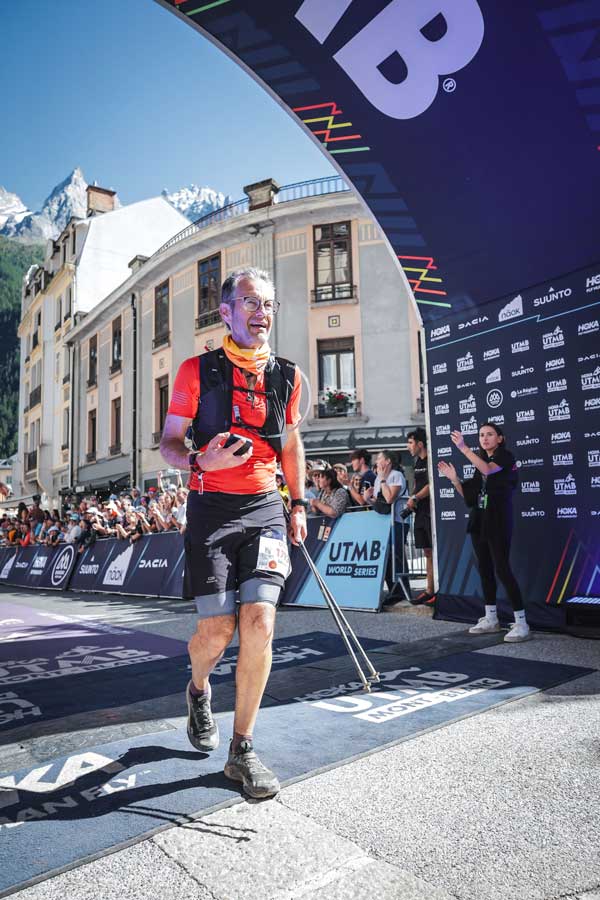 Advita Ortho Running Toward Mont Blanc: Laurent Angibaud and the Long Road to UTMB crossing the finish line at race